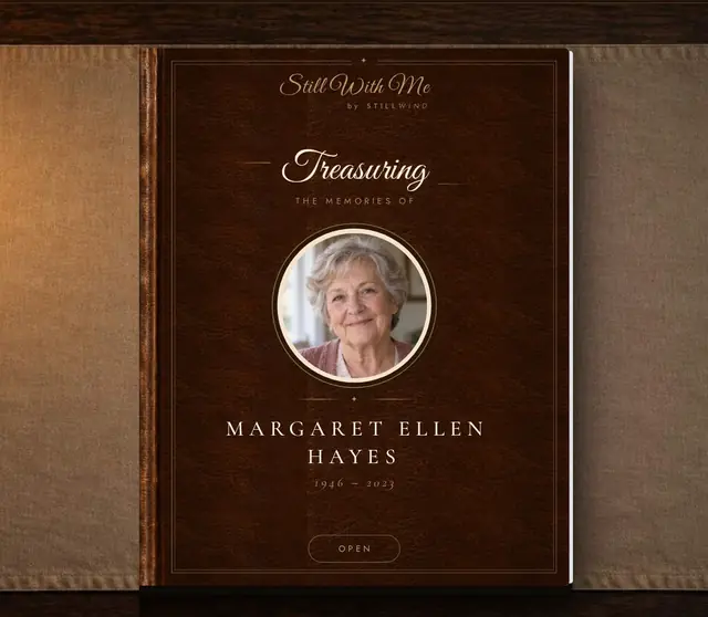 The cover of a sample Still With Me book, closed on a desk